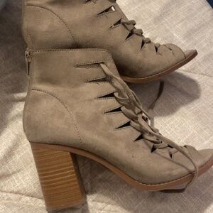 lace-up peep-toe block-heel booties.